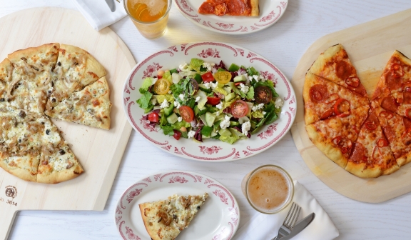 Pizzas, salad and drinks at PGA National Resort.