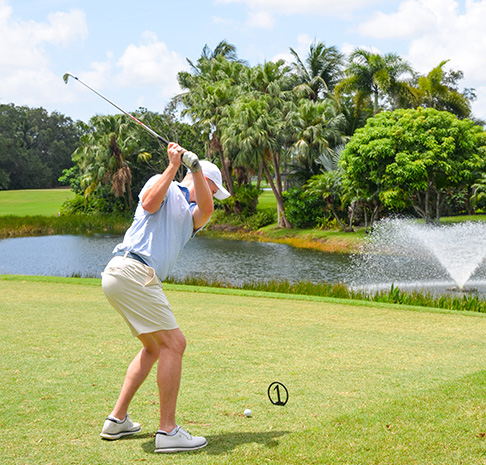 Man swinging a golf club