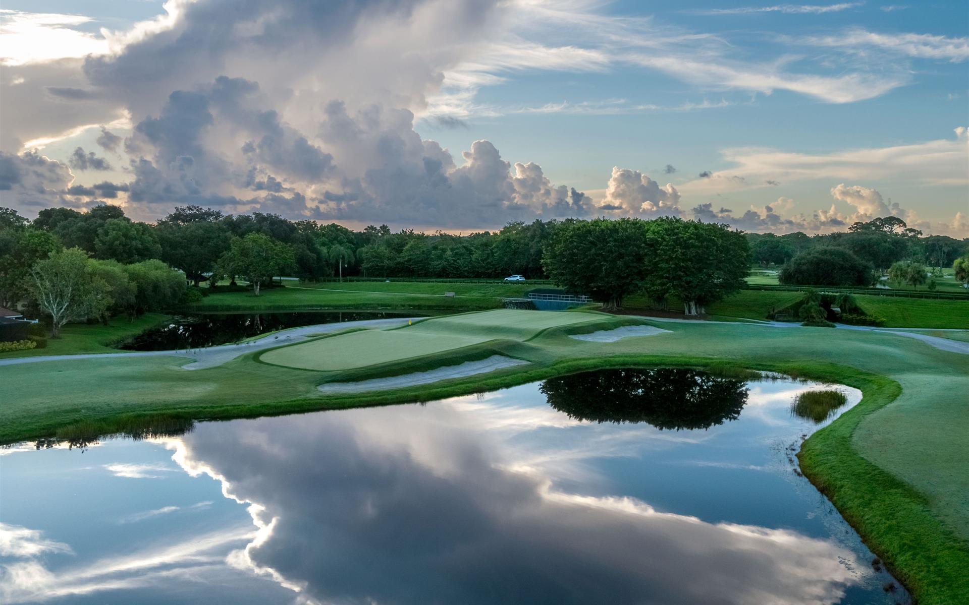 woman hitting golf club on golf course at Innisbrook Golf Resort