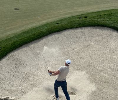Golfer swinging