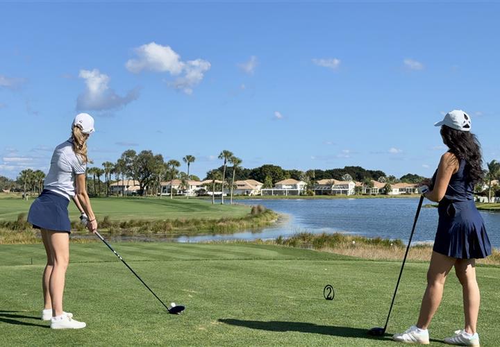 women golfing