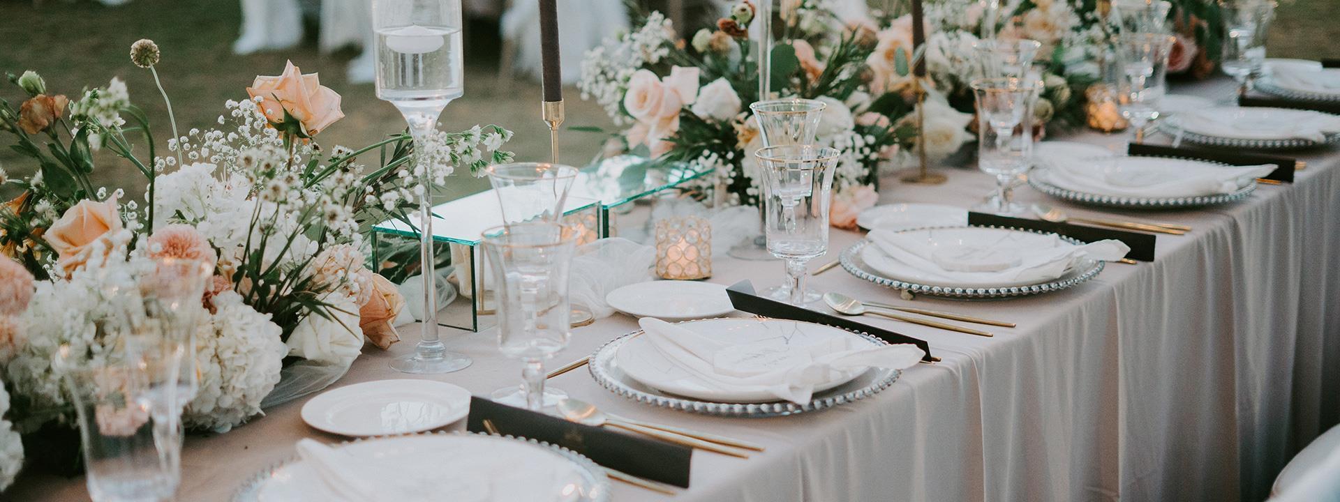 Dining table with floral arrangements
